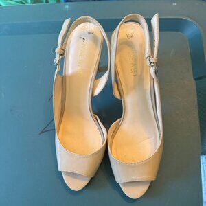 Nine West "Eastwood" tan slingback heels.  Man made.  Size 8.5.